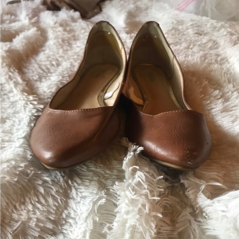 Brown flats with gold trim